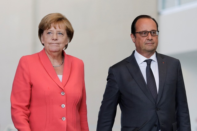 Na snmke nemeck kancelrka Angela Merkelov (vavo) a franczsky prezident Francois Hollande Foto:Markus Schreiber
